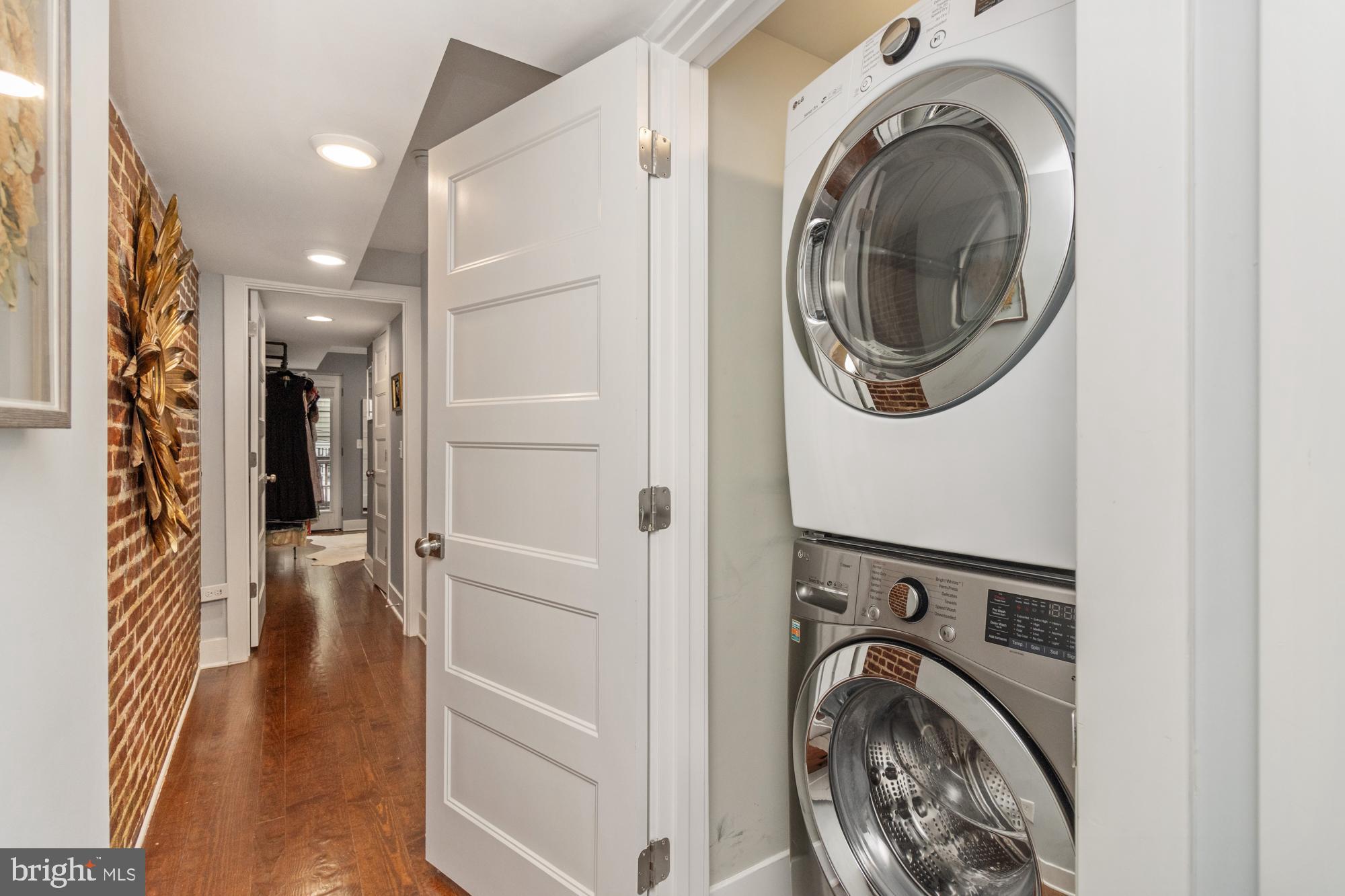 217 East Cross Street Baltimore, MD 21230 - Photo 20 of 50 a view of a hallway with washer and dryer