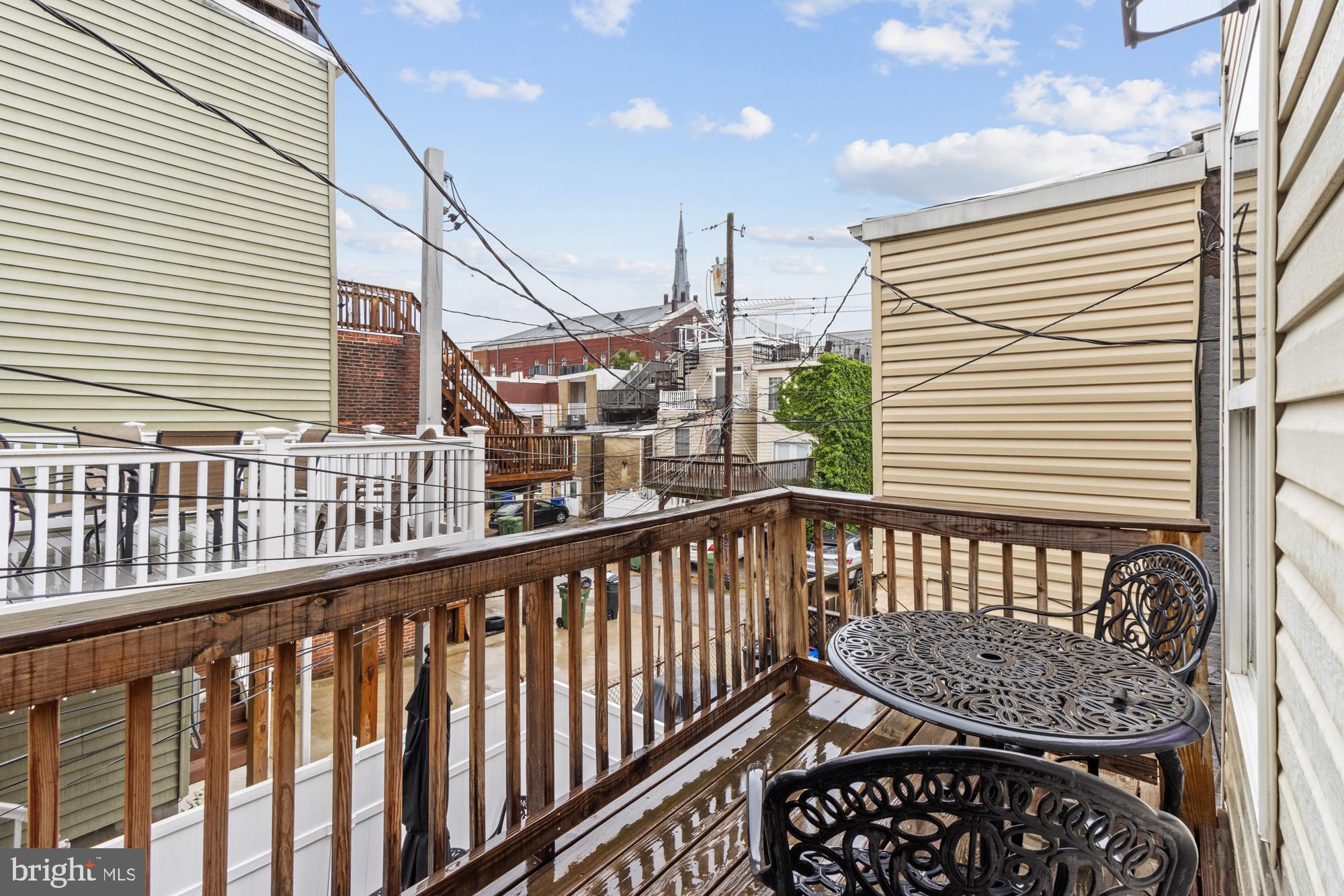 217 East Cross Street Baltimore, MD 21230 - Photo 44 of 50 a view of a balcony with furniture