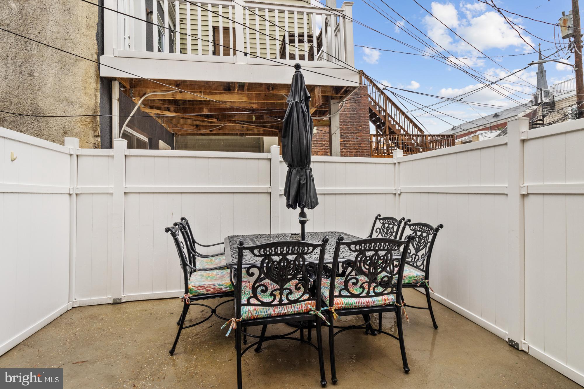 217 East Cross Street Baltimore, MD 21230 - Photo 45 of 50 a view of a chairs and table in the patio