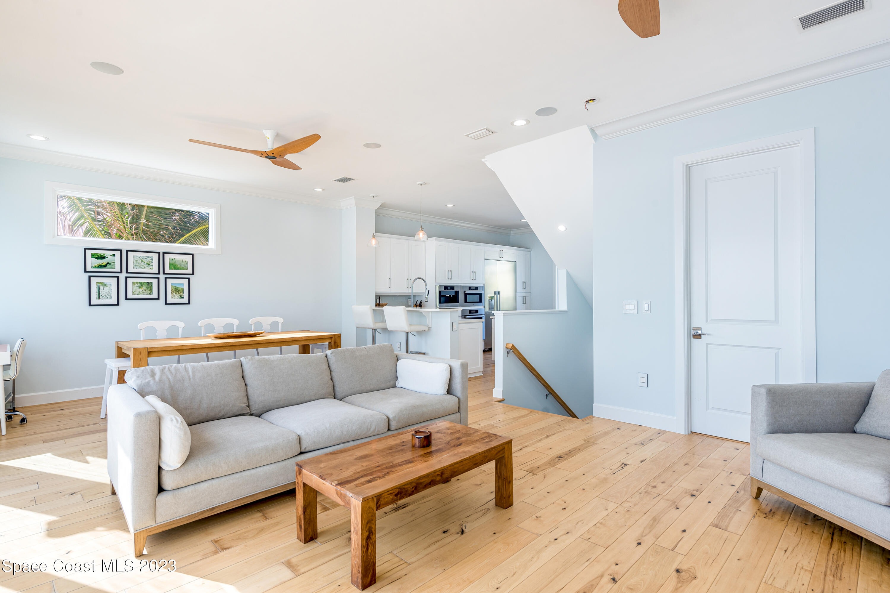 795 Shell Street Satellite Beach, FL 32937 - Photo 17 of 42 a living room with furniture and wooden floor