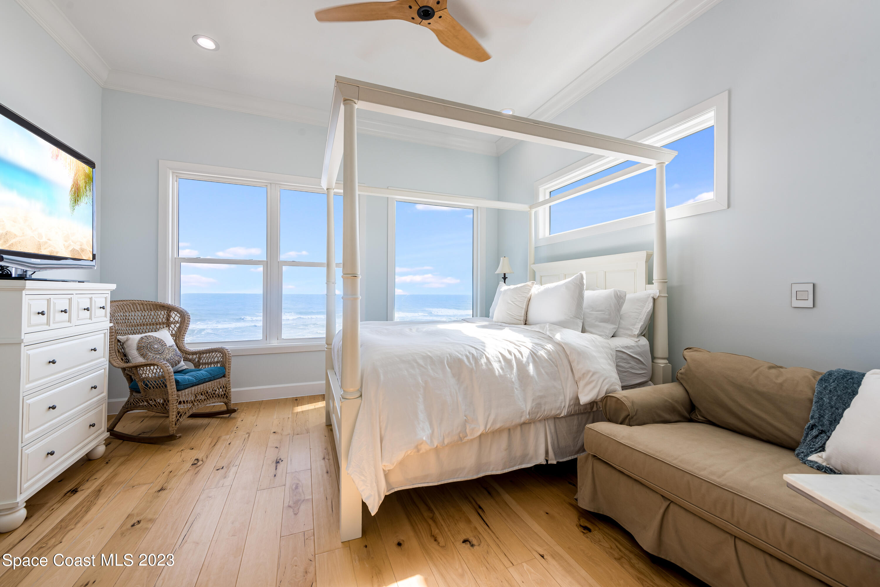 795 Shell Street Satellite Beach, FL 32937 - Photo 27 of 42 a bedroom with bed and window