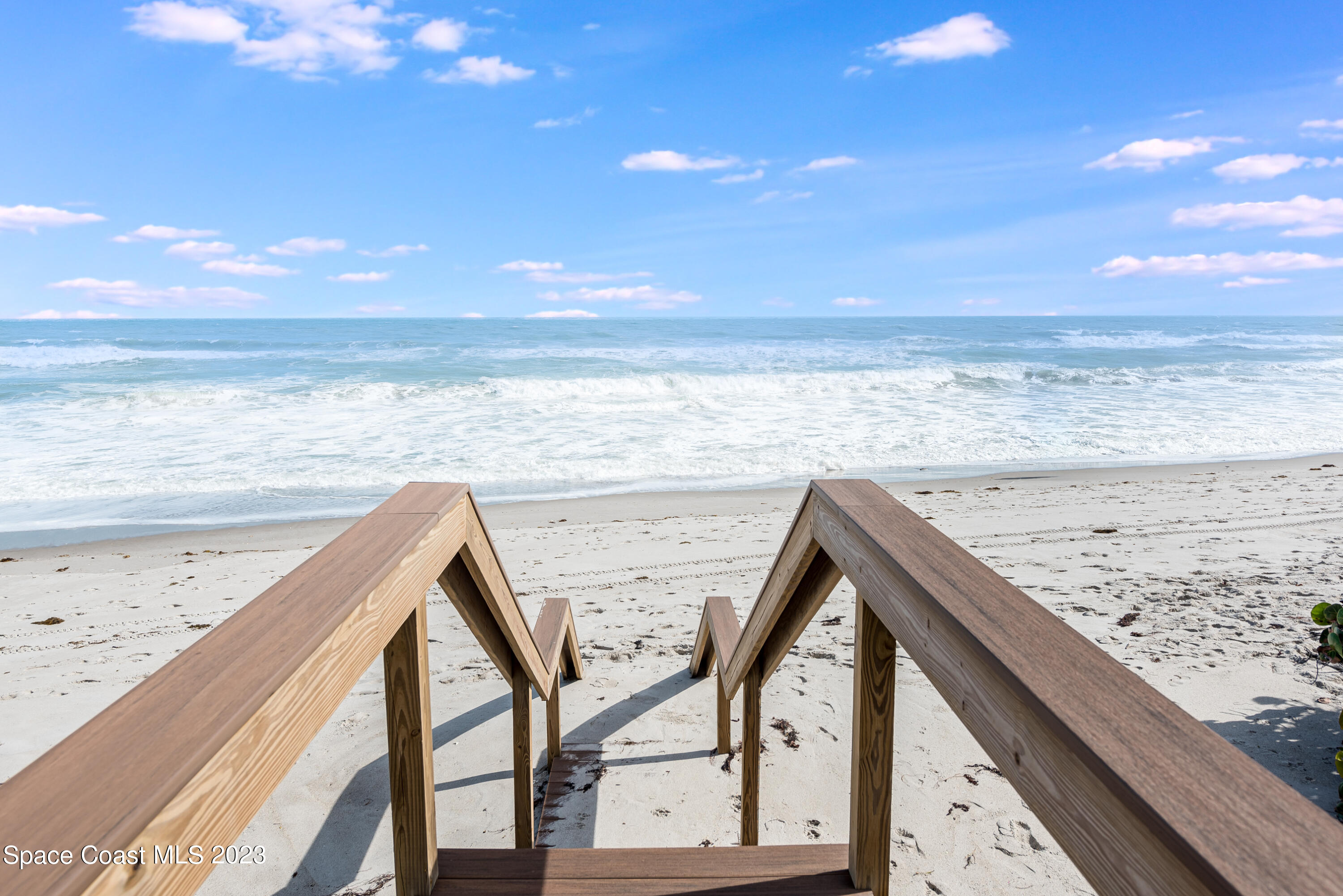 795 Shell Street Satellite Beach, FL 32937 - Photo 32 of 42 a view of an ocean and beach