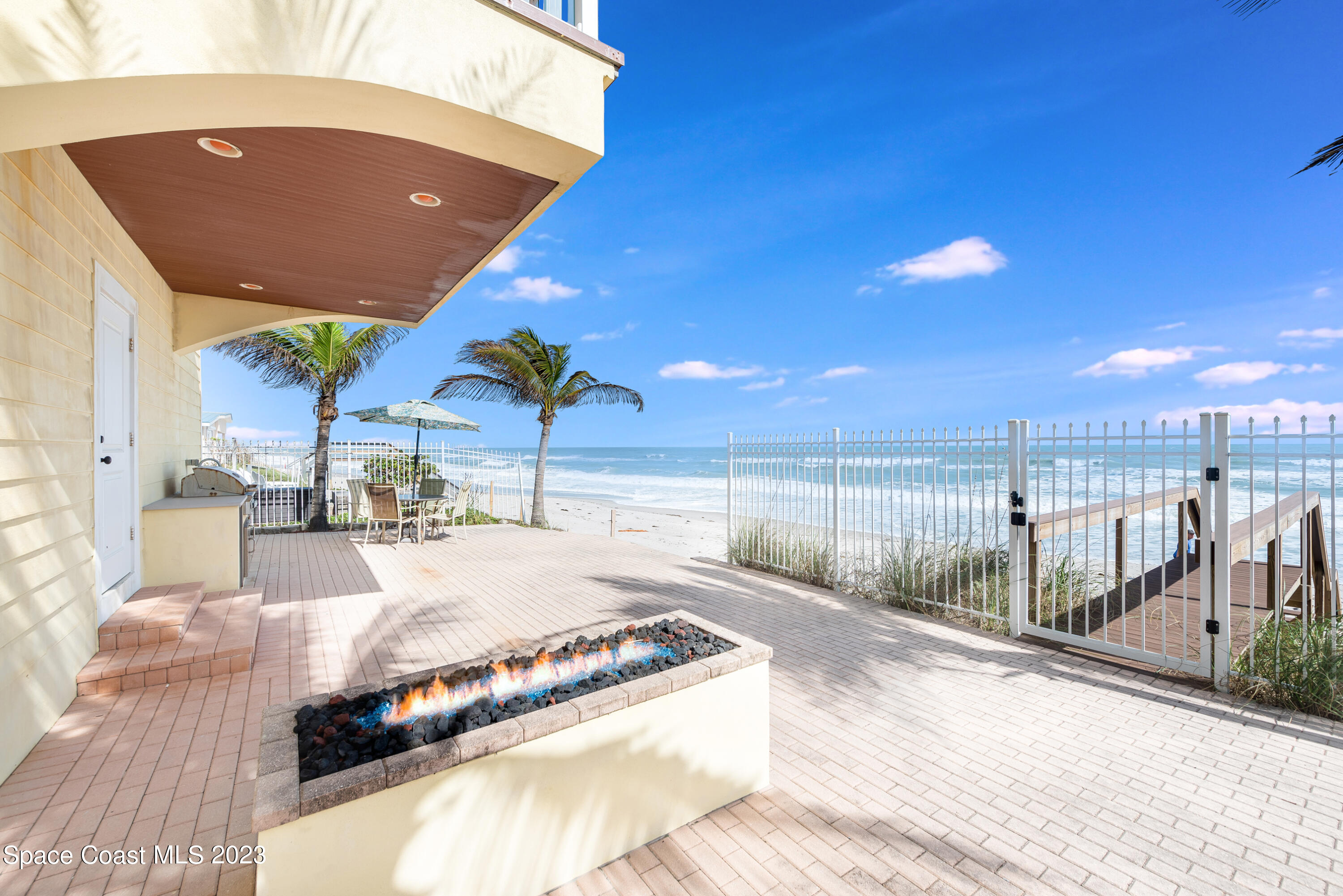 795 Shell Street Satellite Beach, FL 32937 - Photo 35 of 42 a swimming pool with outdoor seating and yard