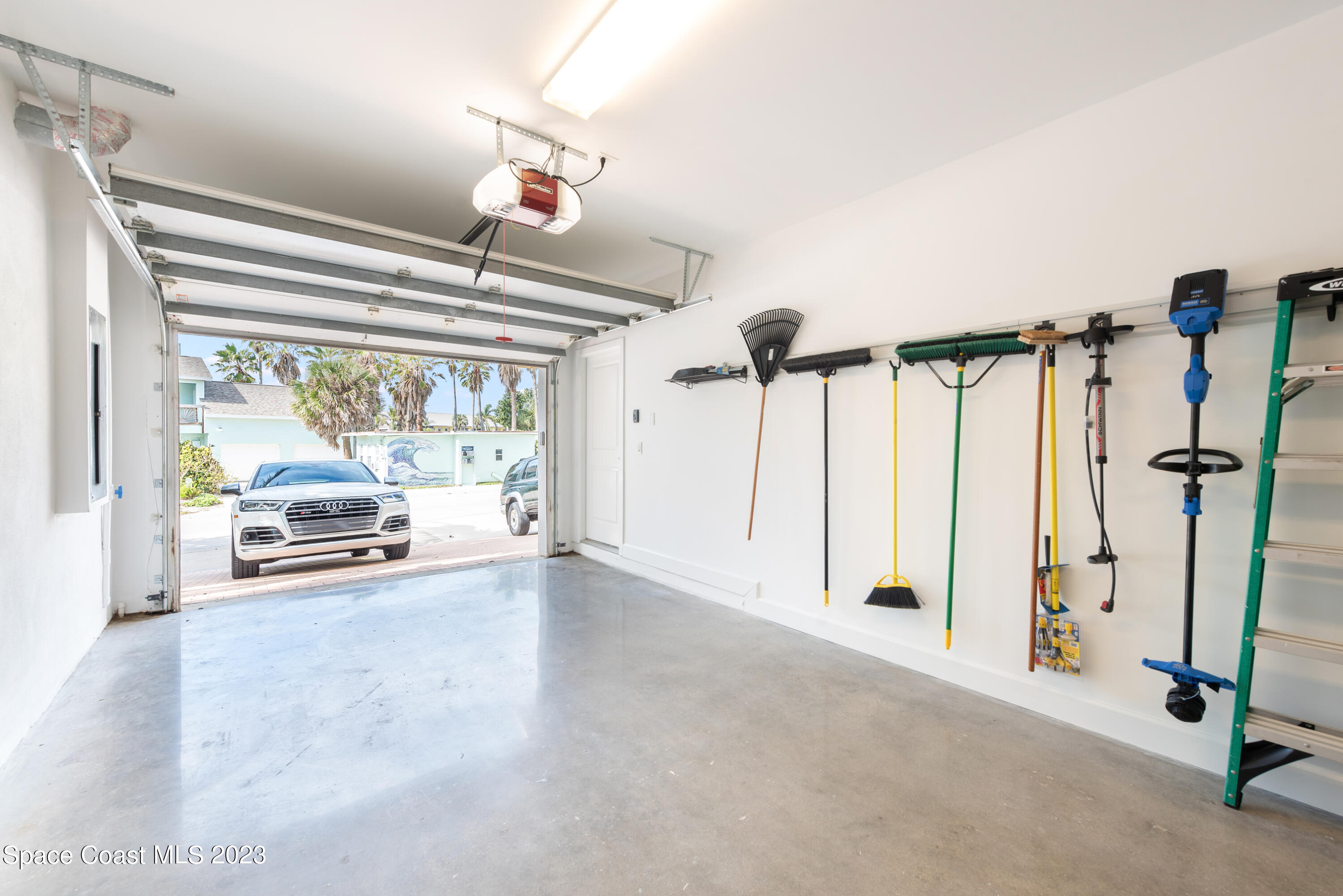795 Shell Street Satellite Beach, FL 32937 - Photo 38 of 42 a view of a hallway with windows