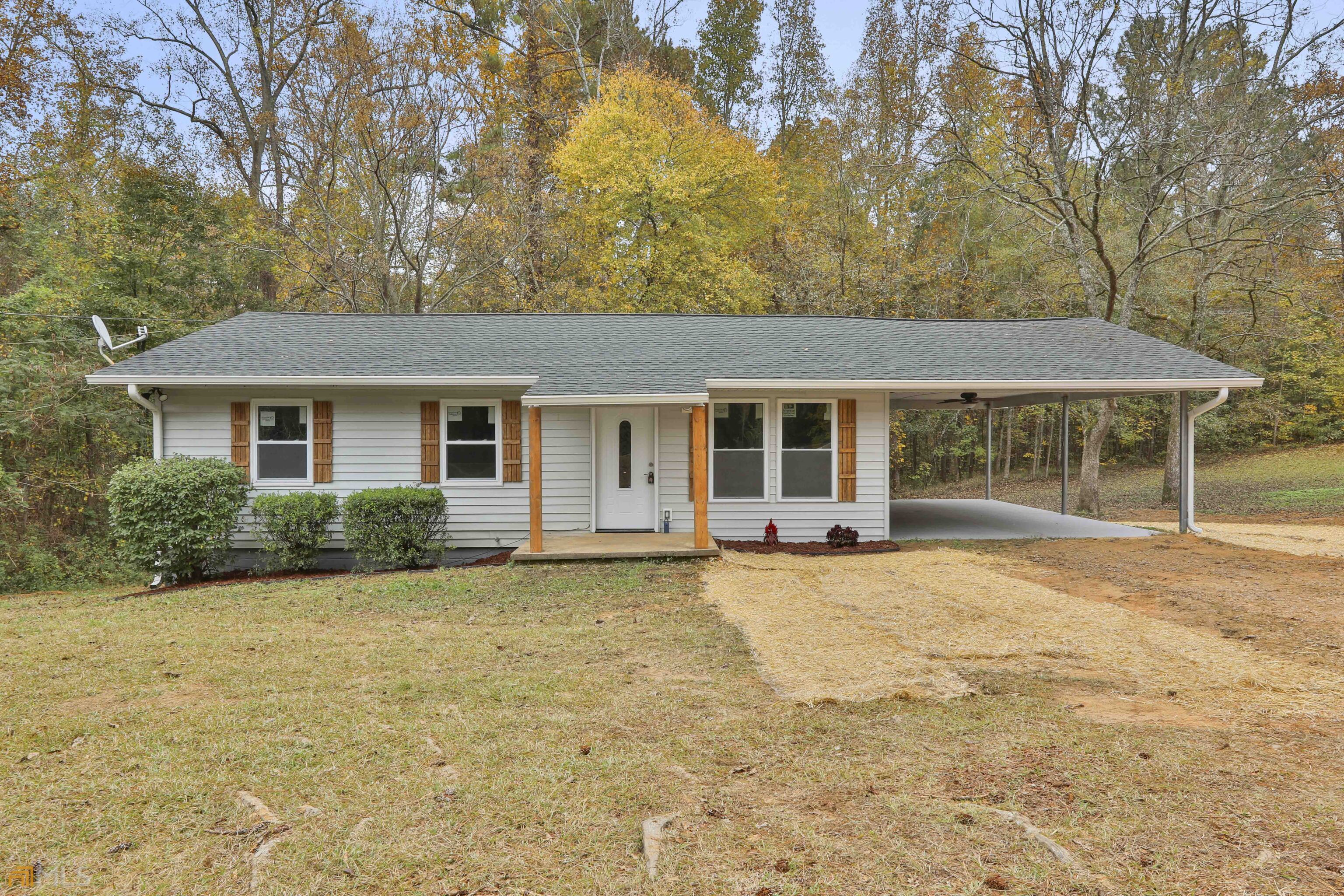 front view of a house with a patio