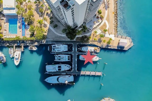 a view of a chairs and table in patio