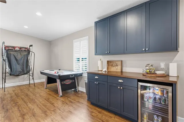 a bathroom with a toilet a sink and a shower