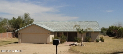 7401 North Perryville Road Waddell, AZ 85355 - Photo 1 of 17 front