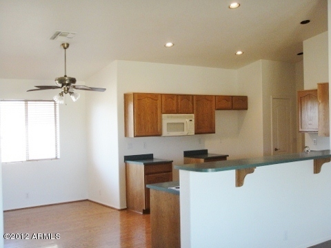 7401 North Perryville Road Waddell, AZ 85355 - Photo 3 of 17 kitchen