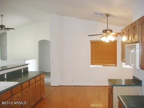 7401 North Perryville Road Waddell, AZ 85355 - Photo 6 of 17 kitchen
