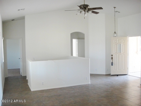 7401 North Perryville Road Waddell, AZ 85355 - Photo 9 of 17 great room to the back yard
