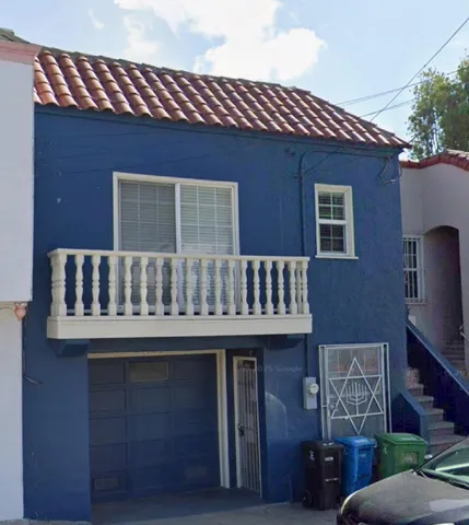 a view of a house with a deck