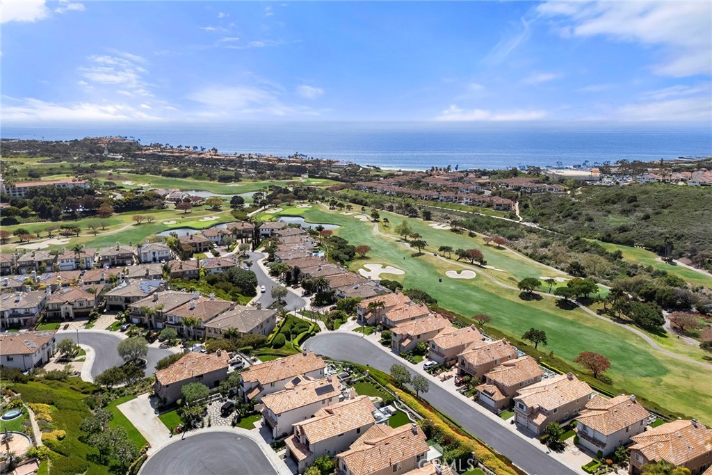 5 Monaco Dana Point, CA 92629 - Photo 19 of 19 an aerial view of a city with lots of residential buildings and mountain view in back