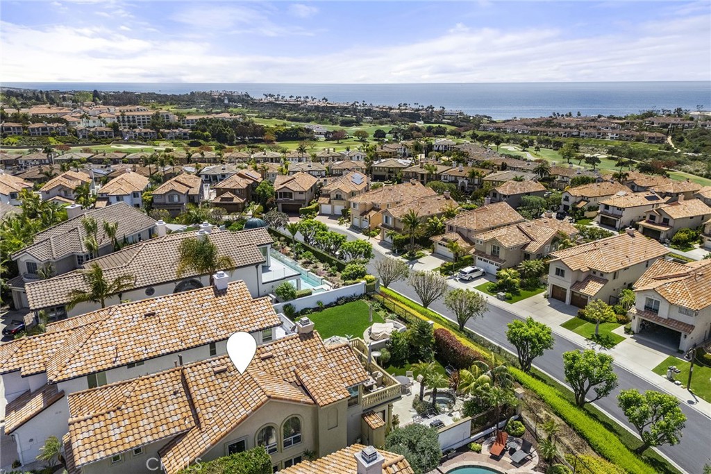 5 Monaco Dana Point, CA 92629 - Photo 3 of 19 an aerial view of residential building with parking
