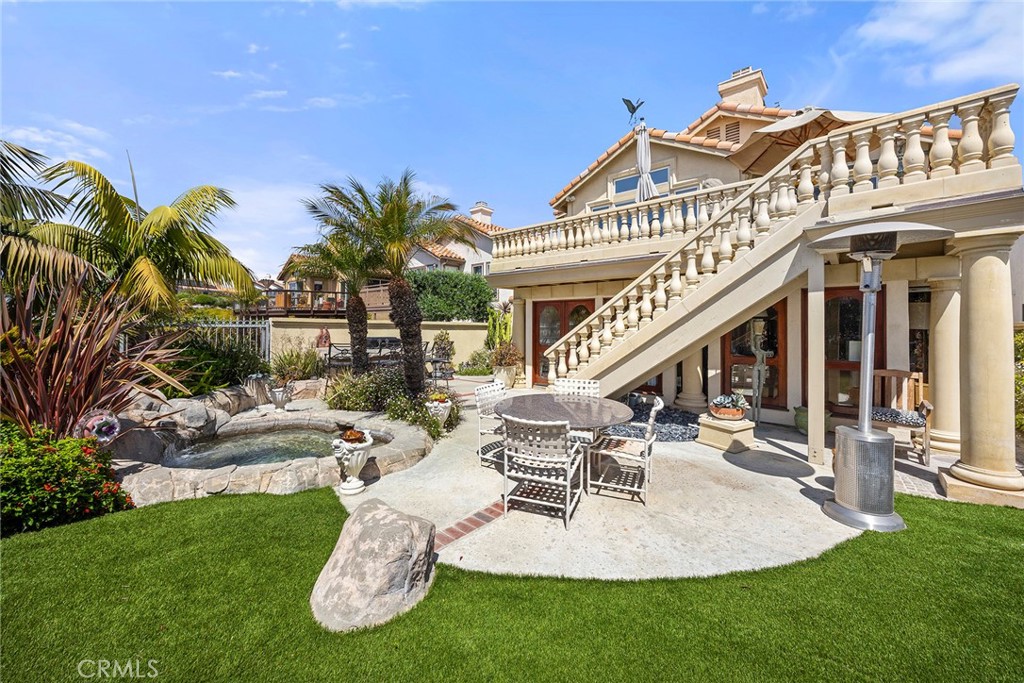 5 Monaco Dana Point, CA 92629 - Photo 6 of 19 a view of a house with backyard porch and sitting area