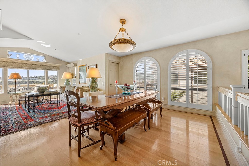 5 Monaco Dana Point, CA 92629 - Photo 9 of 19 a dining room with furniture wooden floor and a rug