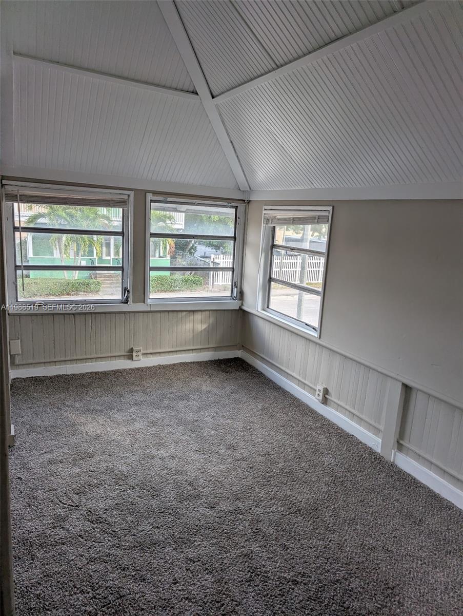 700 Boston Avenue, Unit B Fort Pierce, FL 34950 - Photo 3 of 12 an empty room with windows