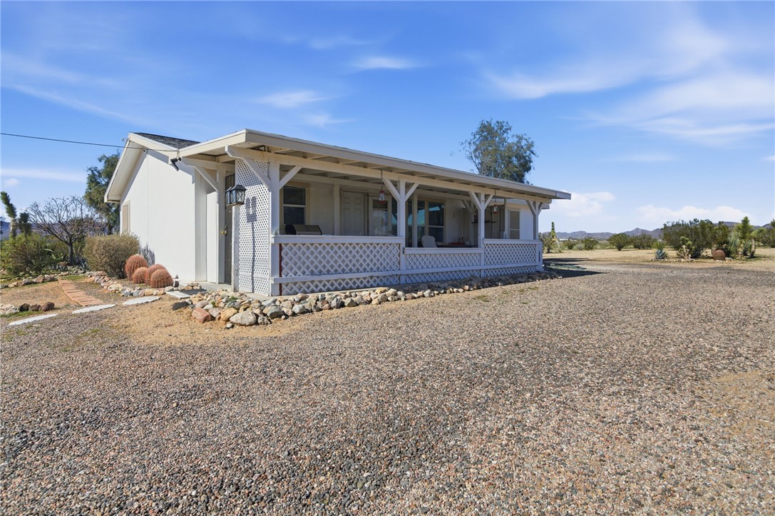 4342 Cordes Road Golden Valley, AZ 86413 - Photo 9 of 39 a front view of a house with a yard