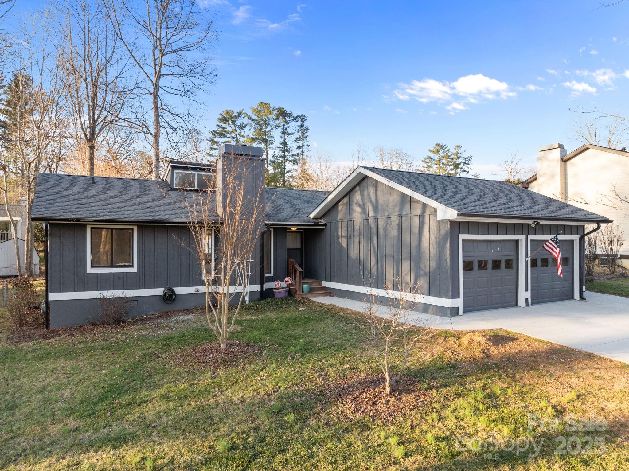 17 Berry Lane Fletcher, NC 28732 - Photo 2 of 47 a house that has a tree in front of it