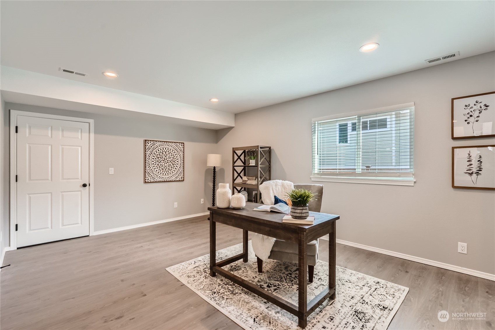 11409 Southeast 177th Place Renton, WA 98055 - Photo 11 of 27 a living room with furniture and a window