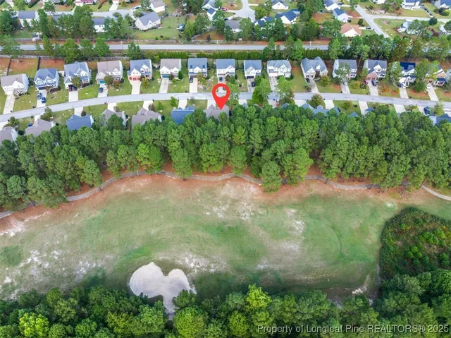a view of swimming pool with a yard
