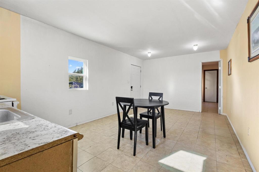 5777 State Highway 160 Whitewright, TX 75491 - Photo 29 of 36 a workspace with furniture and window