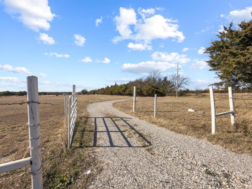 5777 State Highway 160 Whitewright, TX 75491 - Photo 5 of 36 a view of a backyard