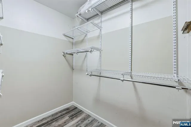 a view of a room with racks on the wall