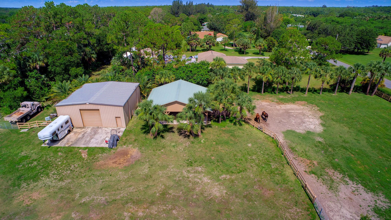9650 Sandy Run Road Jupiter, FL 33478 - Photo 29 of 30 Aerial view of barn, and utility garage