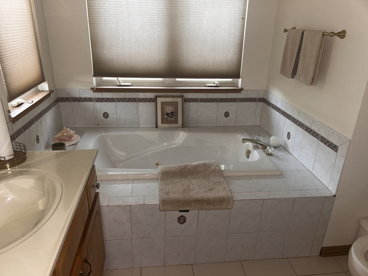 18623 Augusta Lane Hazel Crest, IL 60429 - Photo 13 of 21 a bathroom with a granite countertop sink a mirror and vanity