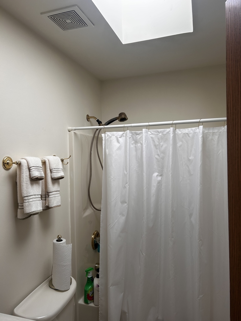 18623 Augusta Lane Hazel Crest, IL 60429 - Photo 15 of 21 a bathroom with a shower and a toilet