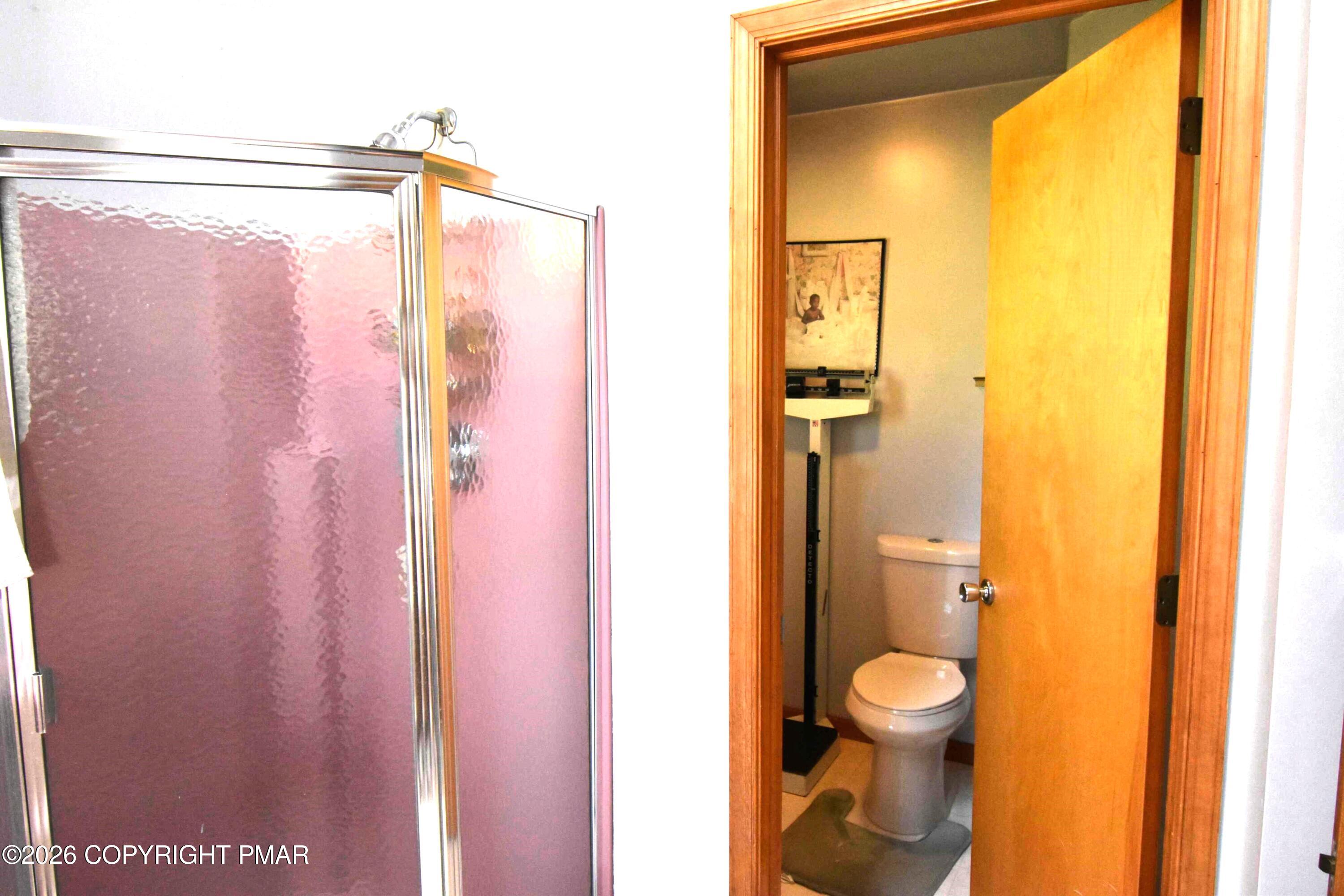 160 Quiet Valley Road Mount Bethel, PA 18343 - Photo 24 of 44 a bathroom with a shower and a toilet