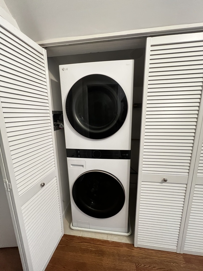 Undisclosed Address Chicago, IL 60657 - Photo 19 of 25 a utility room with dryer and washer