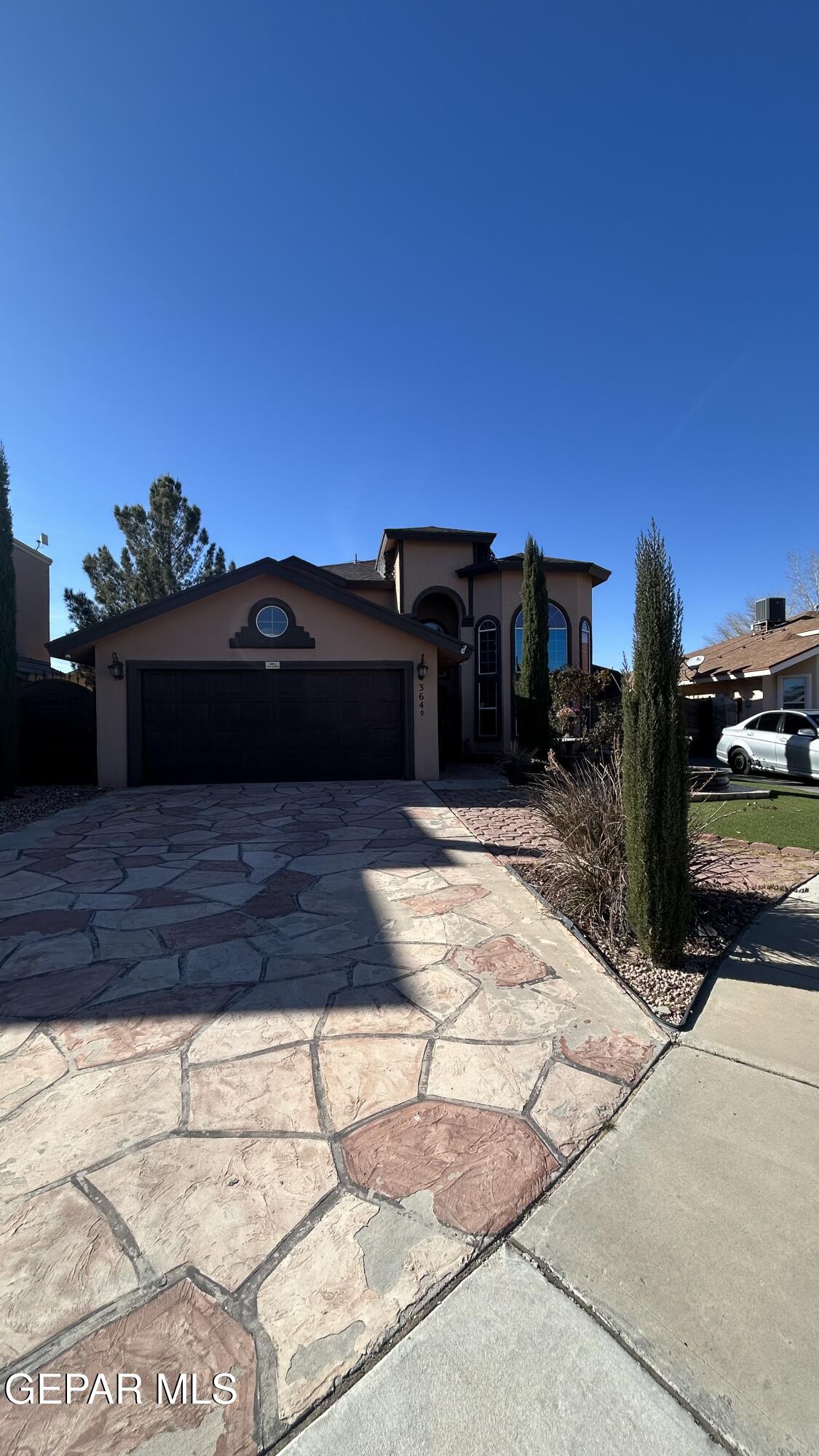 3649 Krista Ilee PIace El Paso, TX 79938 - Photo 2 of 17 a view of a house with a yard