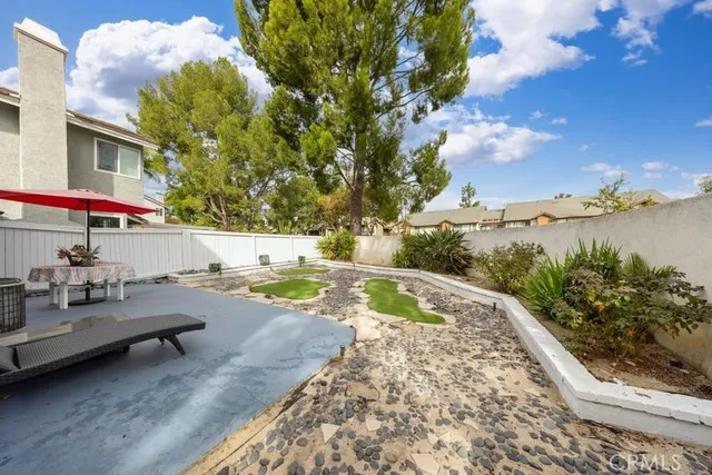 a view of swimming pool with a patio