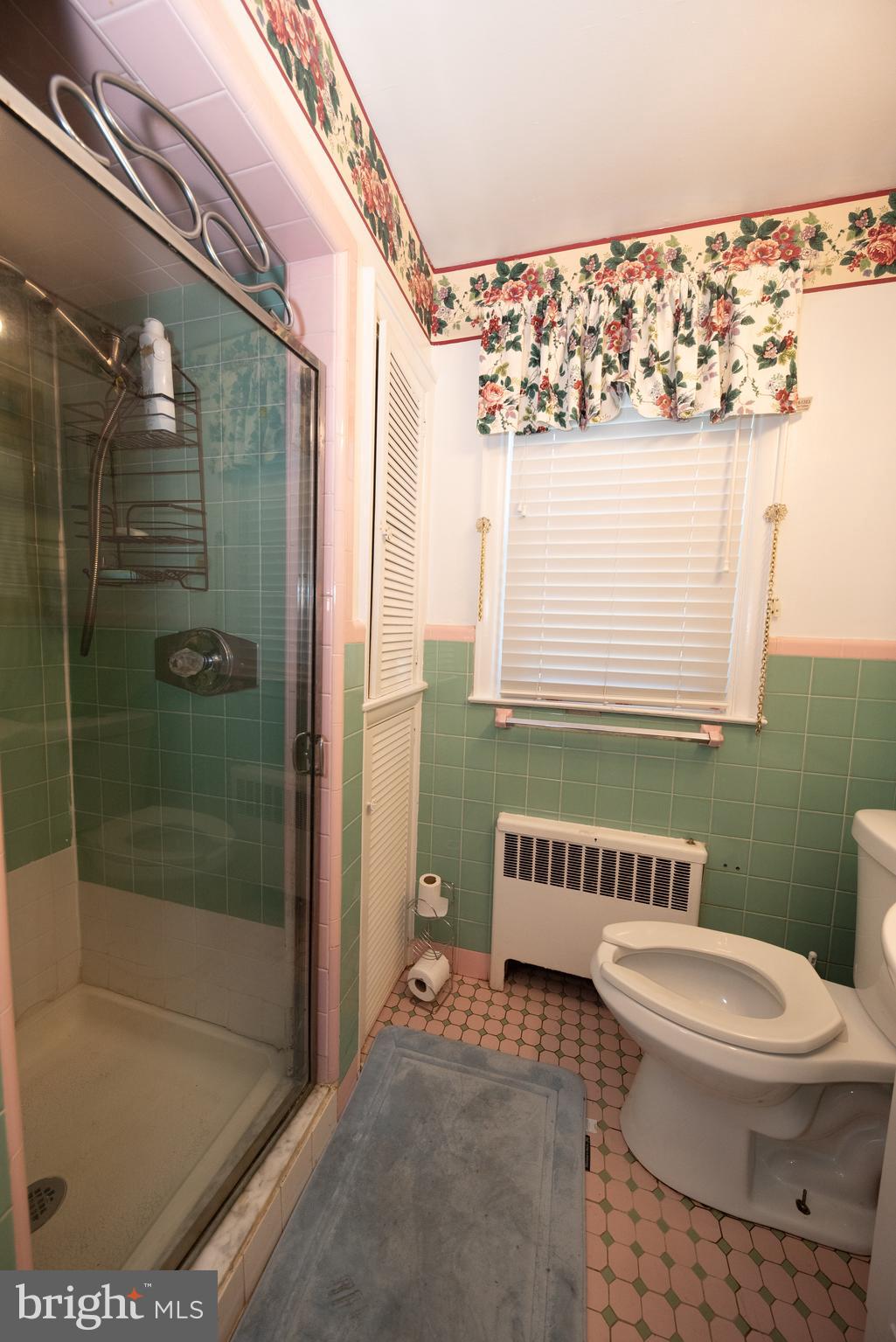 1612 East Willow Grove Avenue Glenside, PA 19038 - Photo 11 of 15 a bathroom with a bathtub and a shower