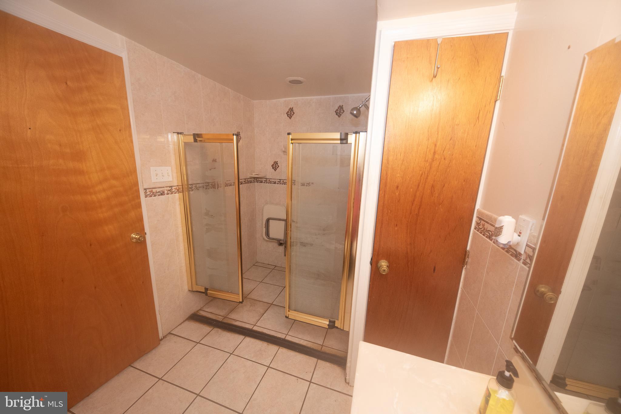 1612 East Willow Grove Avenue Glenside, PA 19038 - Photo 5 of 15 a bathroom with a granite countertop shower and a sink