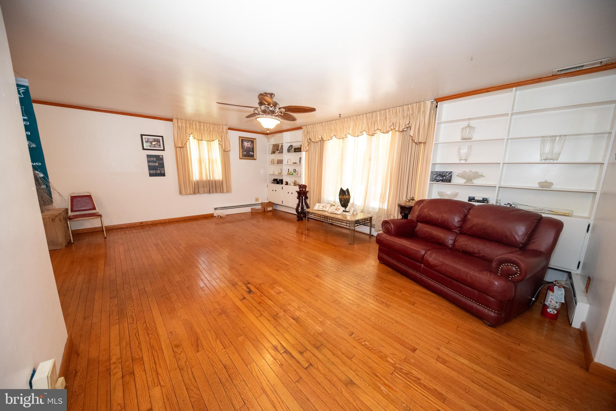 1612 East Willow Grove Avenue Glenside, PA 19038 - Photo 10 of 15 a living room with furniture and a window