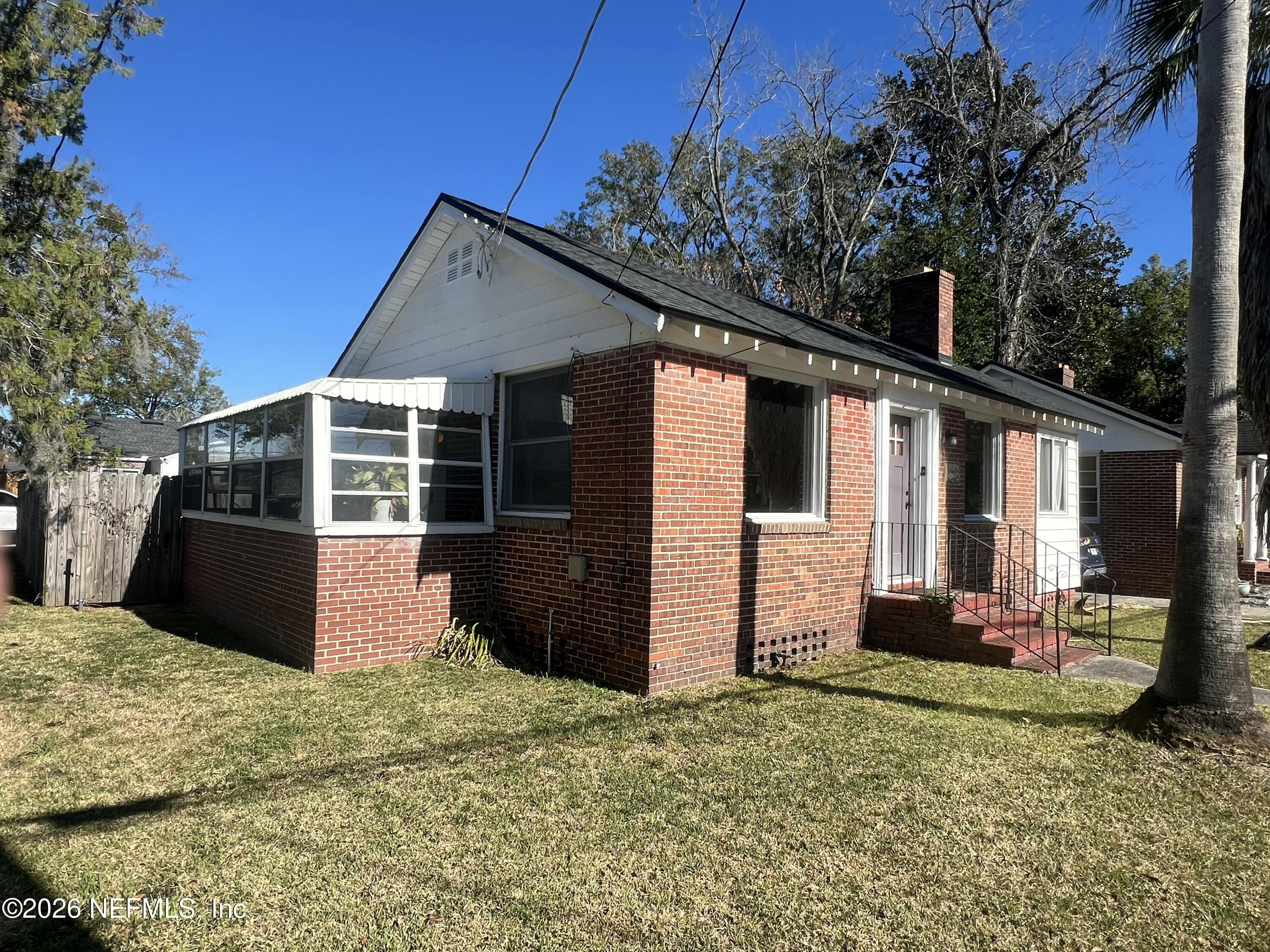 4659 Post Street Jacksonville, FL 32205 - Photo 4 of 24 a front view of a house with porch