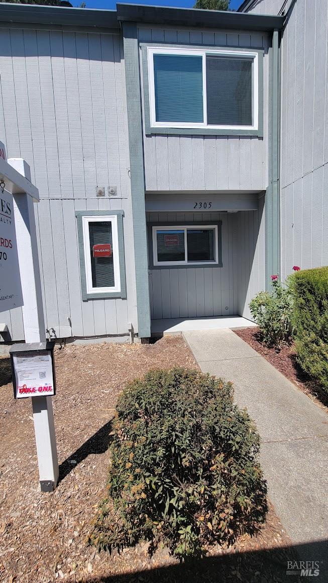 a house view with a outdoor space