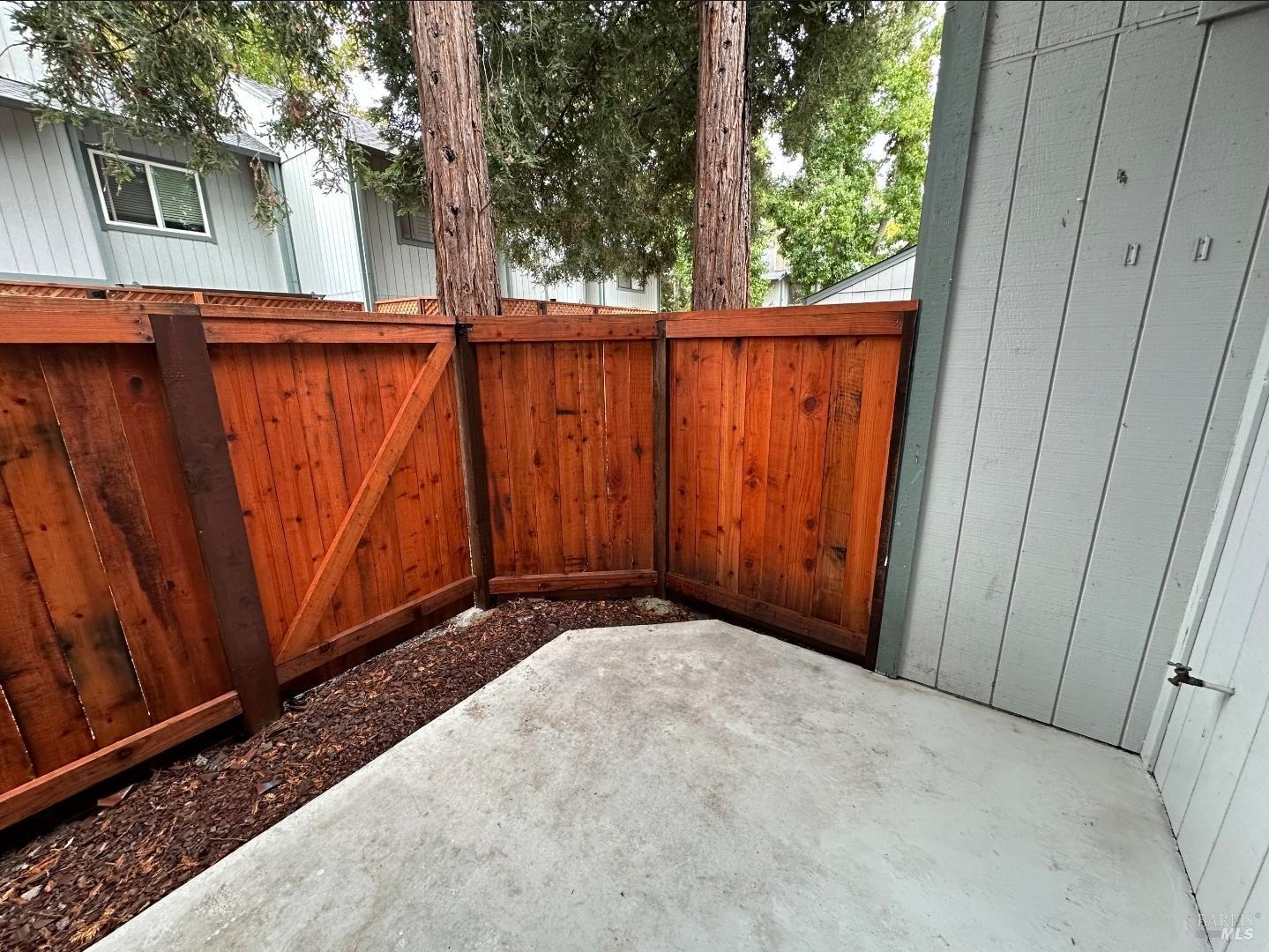 2305 Cross Avenue Santa Rosa, CA 95401 - Photo 18 of 35 a view of a backyard with wooden fence