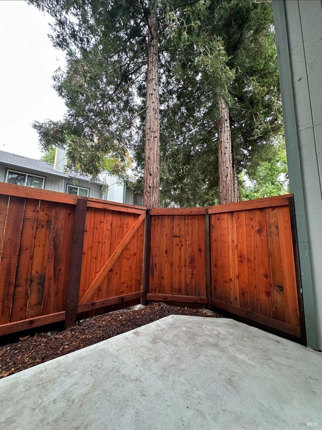 2305 Cross Avenue Santa Rosa, CA 95401 - Photo 19 of 35 a view of a backyard with wooden fence