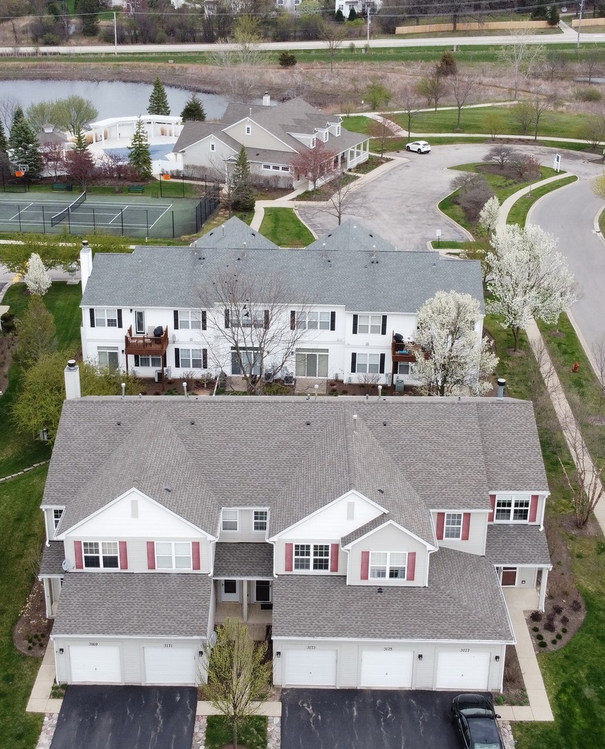 3175 Falling Waters Lane Lindenhurst, IL 60046 - Photo 18 of 19 an aerial view of a house with a lake view