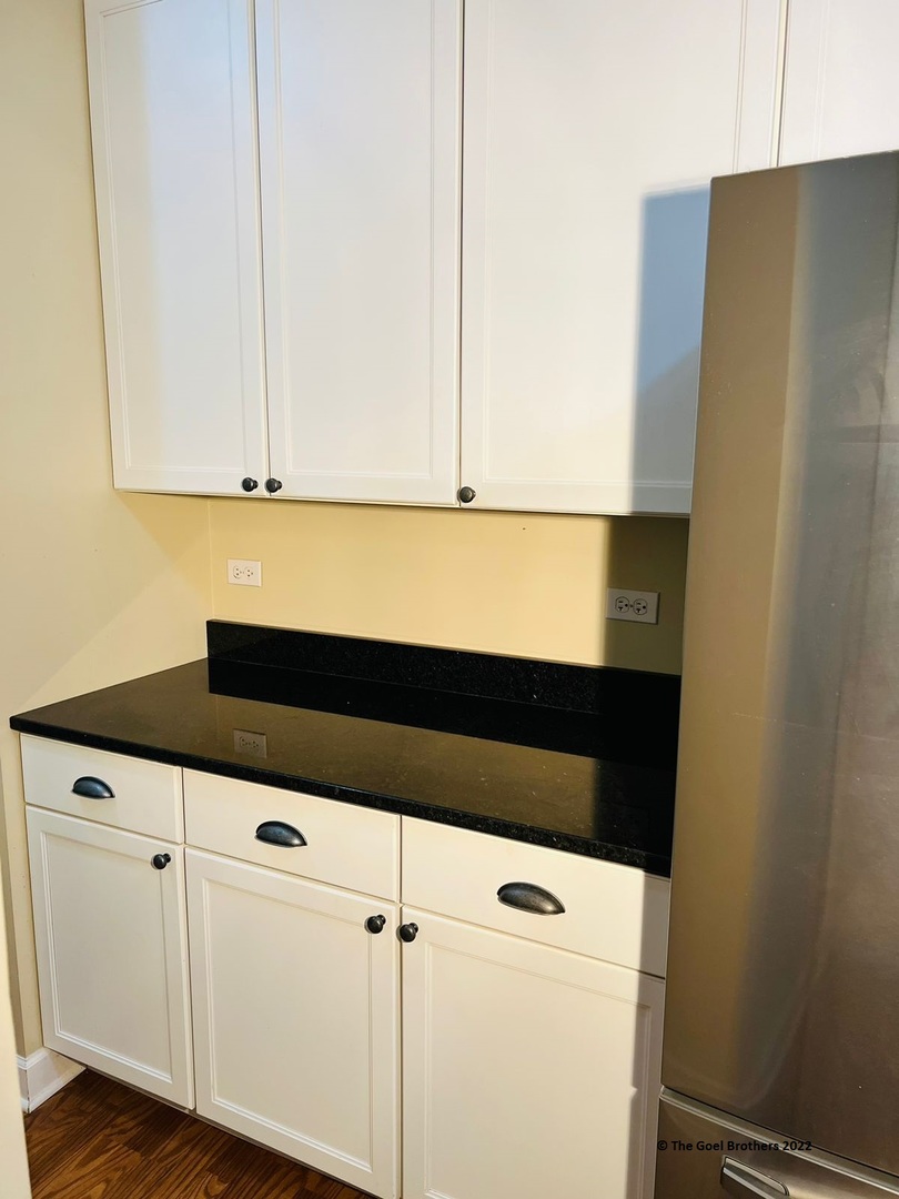 3175 Falling Waters Lane Lindenhurst, IL 60046 - Photo 8 of 19 a close view of wooden cabinets