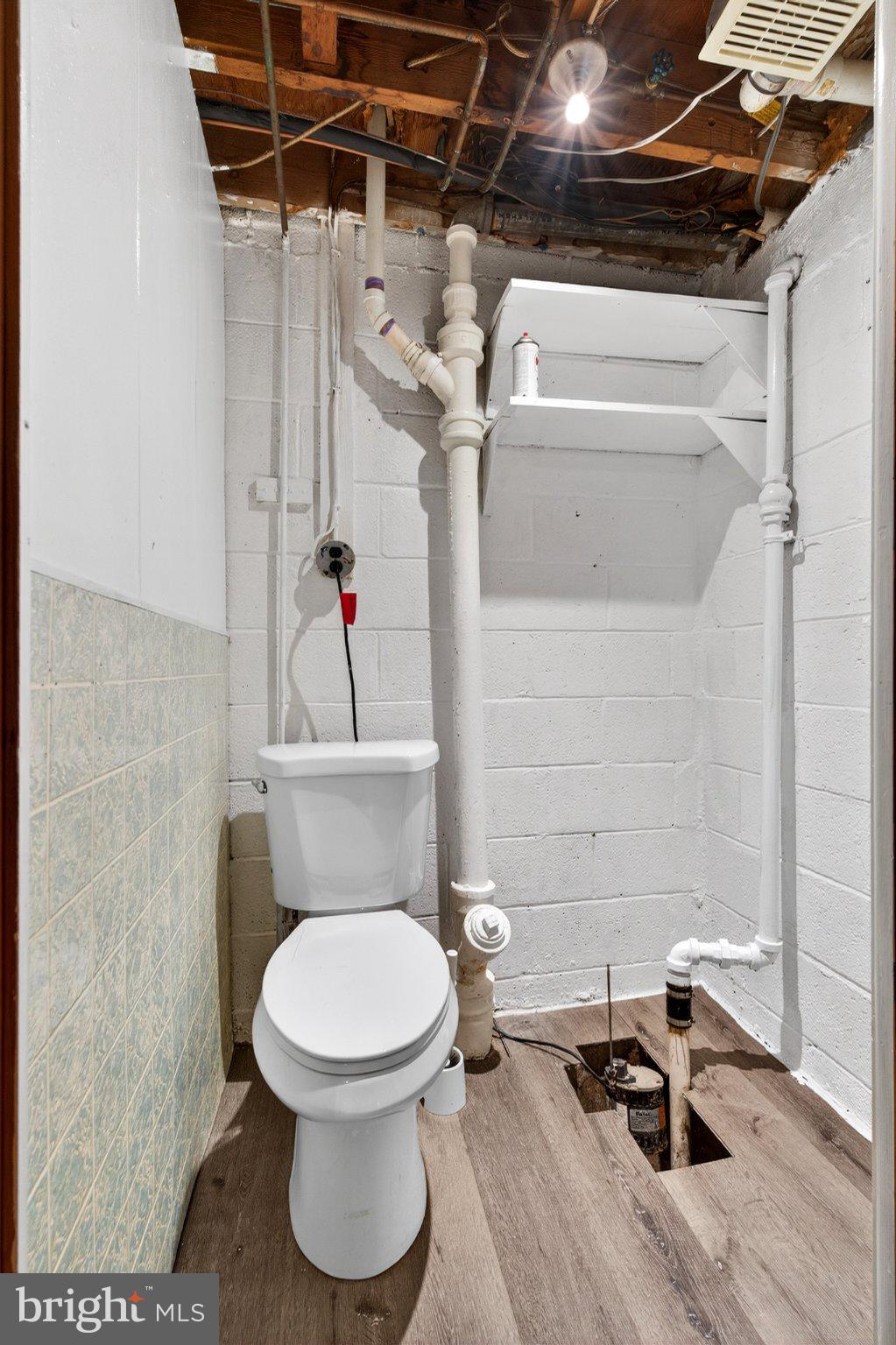 7729 Charlesmont Road Baltimore, MD 21222 - Photo 34 of 38 Functional basement bathroom space.