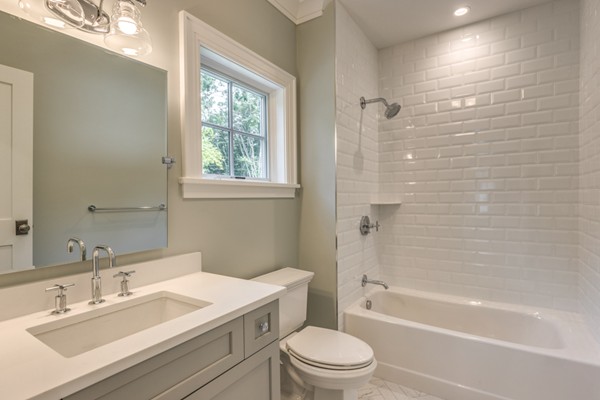 2 Winding Road Lexington, MA 02421 - Photo 15 of 28 a bathroom with a sink a toilet and shower