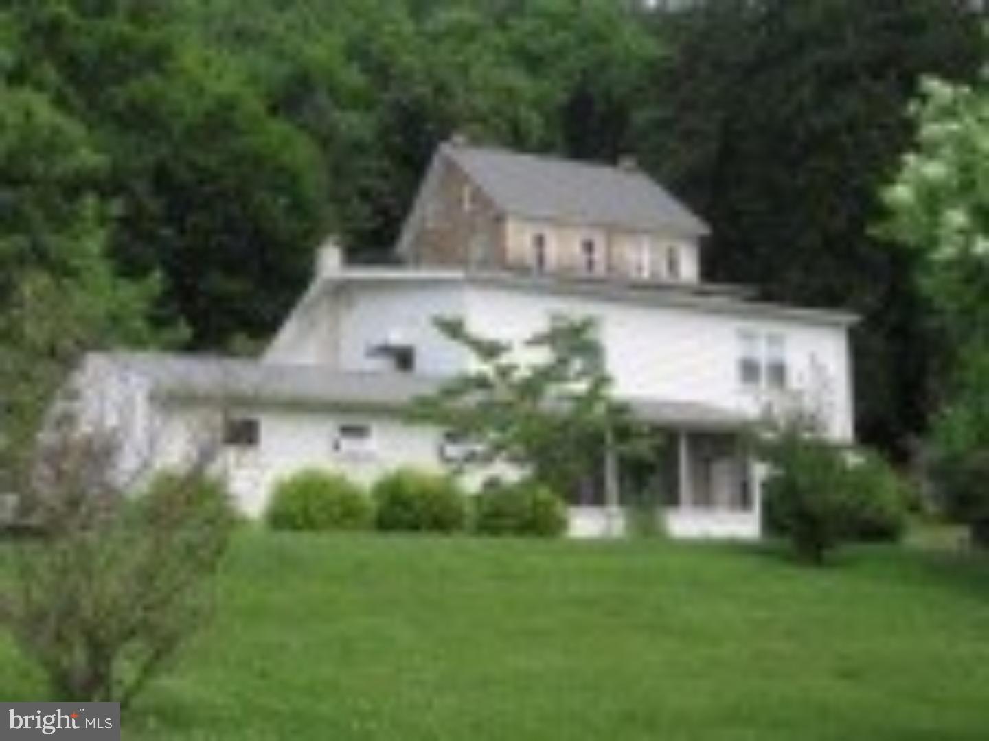 1031 Friedensburg Road Reading, PA 19606 - Photo 1 of 17 a view of house with yard and green space