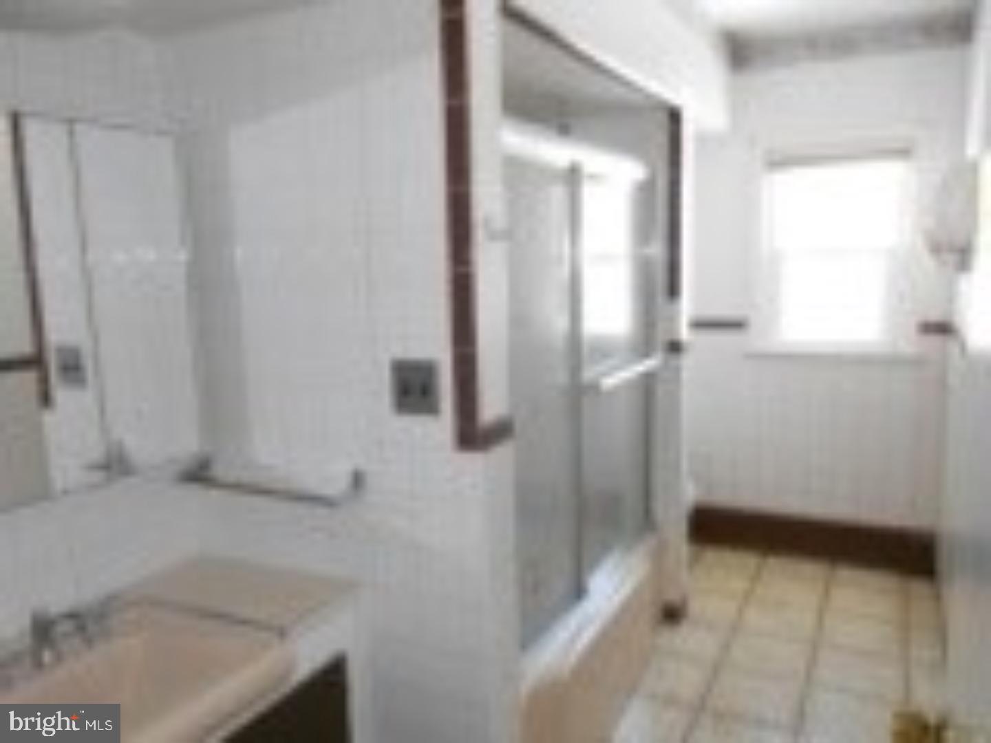 1031 Friedensburg Road Reading, PA 19606 - Photo 10 of 17 a bathroom with a sink and shower