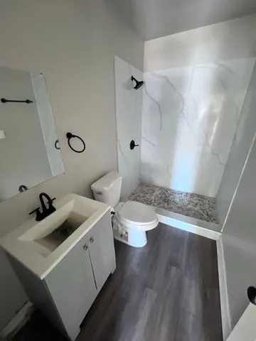 a view of bathroom with a sink and toilet