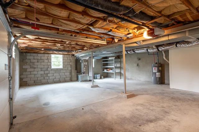 a view of a room with wooden walls